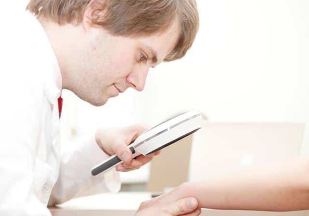 Diagnosis of psoriasis by a dermatologist.